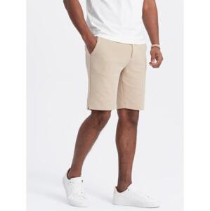 Pánske šortky z textúrovaného úpletu SLIM FIT - pieskové V3 OM-SRCS-0126